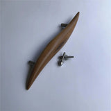 Stylish Wood Ceylon teak door handle featuring a sleek, curved design for modern interiors