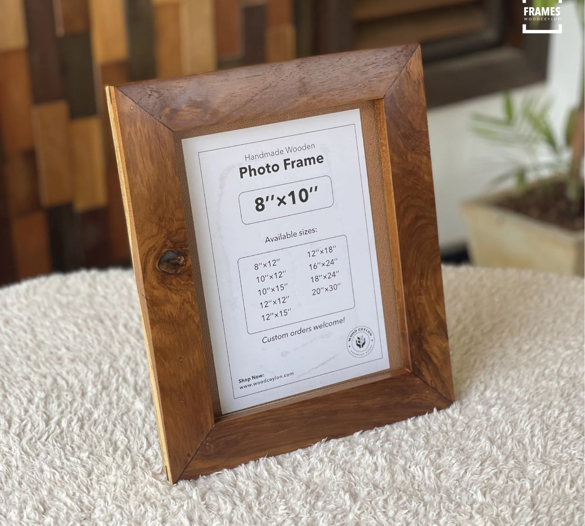 Wooden picture frame made by Wood Ceylon in 8x10 size with natural wood texture on fabric surface