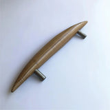 Elegant wooden front door handle with stainless steel ends for a modern touch