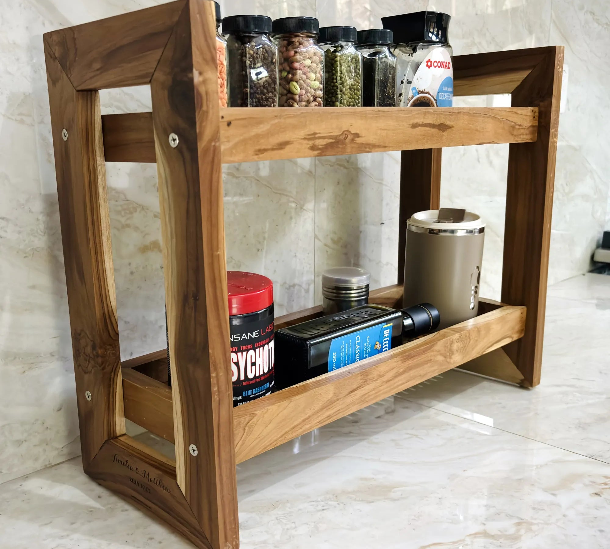 Teak wood countertop spice rack featuring two shelves for organized spice storage