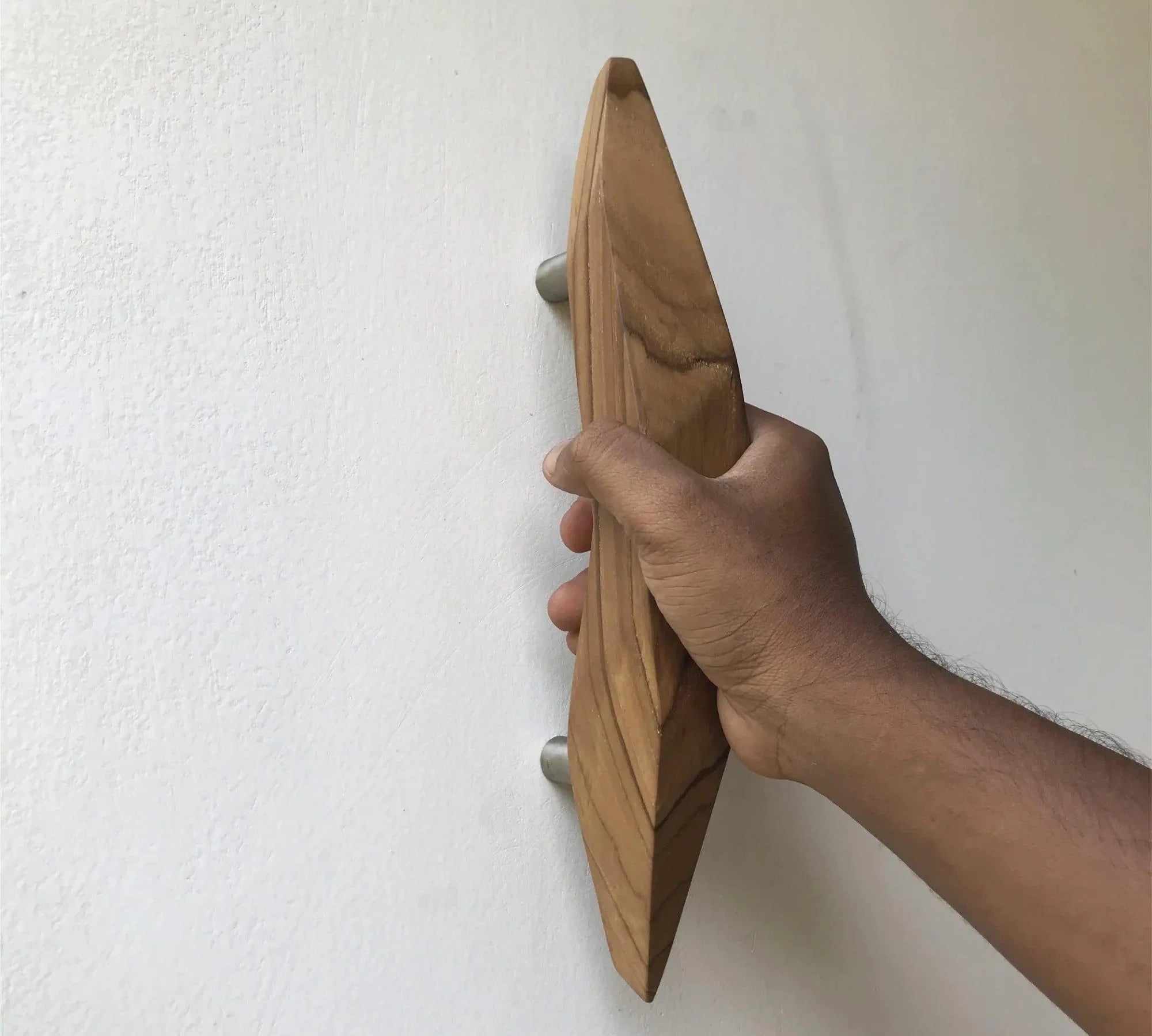 Unique teak door handle with an ergonomic design for stylish and functional home decor