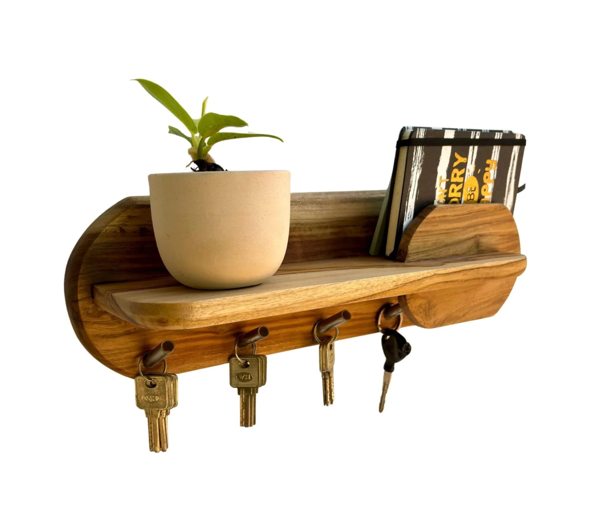 Wooden key holder with shelf featuring a plant and a notepad for convenient organization