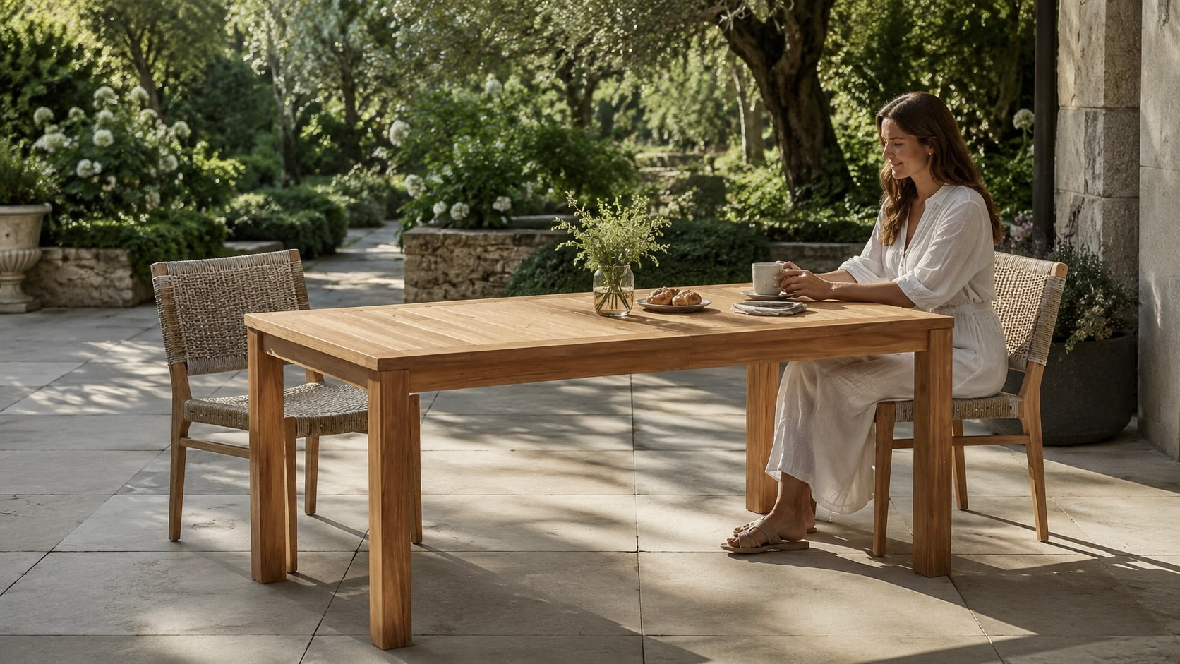 teak outdoor table on a garden patio