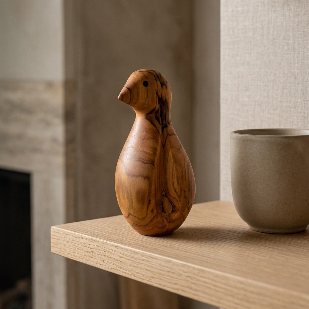 Teak bird sculpture finish samples in Clear, Burma, Walnut, Ebony