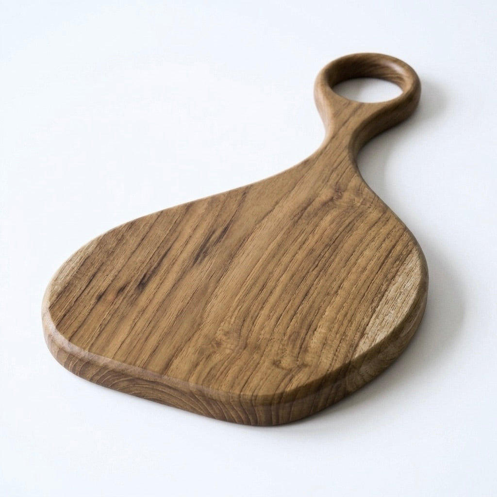 Wooden cutting board with handle on a white background