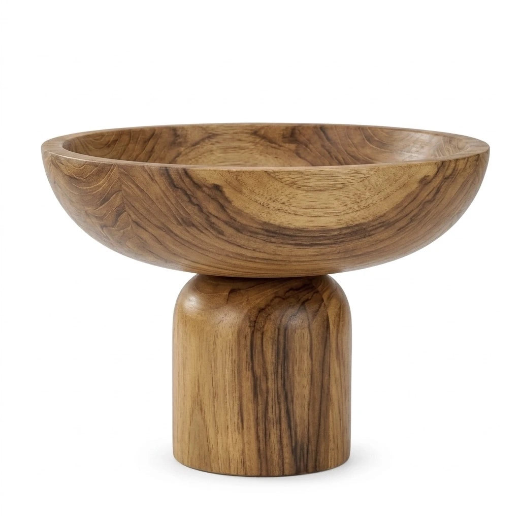 Close-up of natural teak wood grain on a hand-sanded pedestal bowl