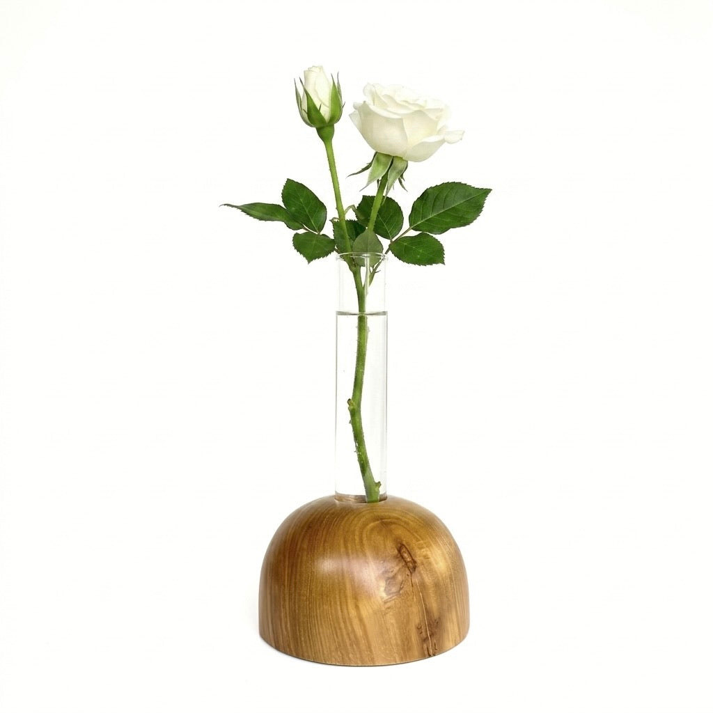 Teak dome vase styled with greenery on a shelf