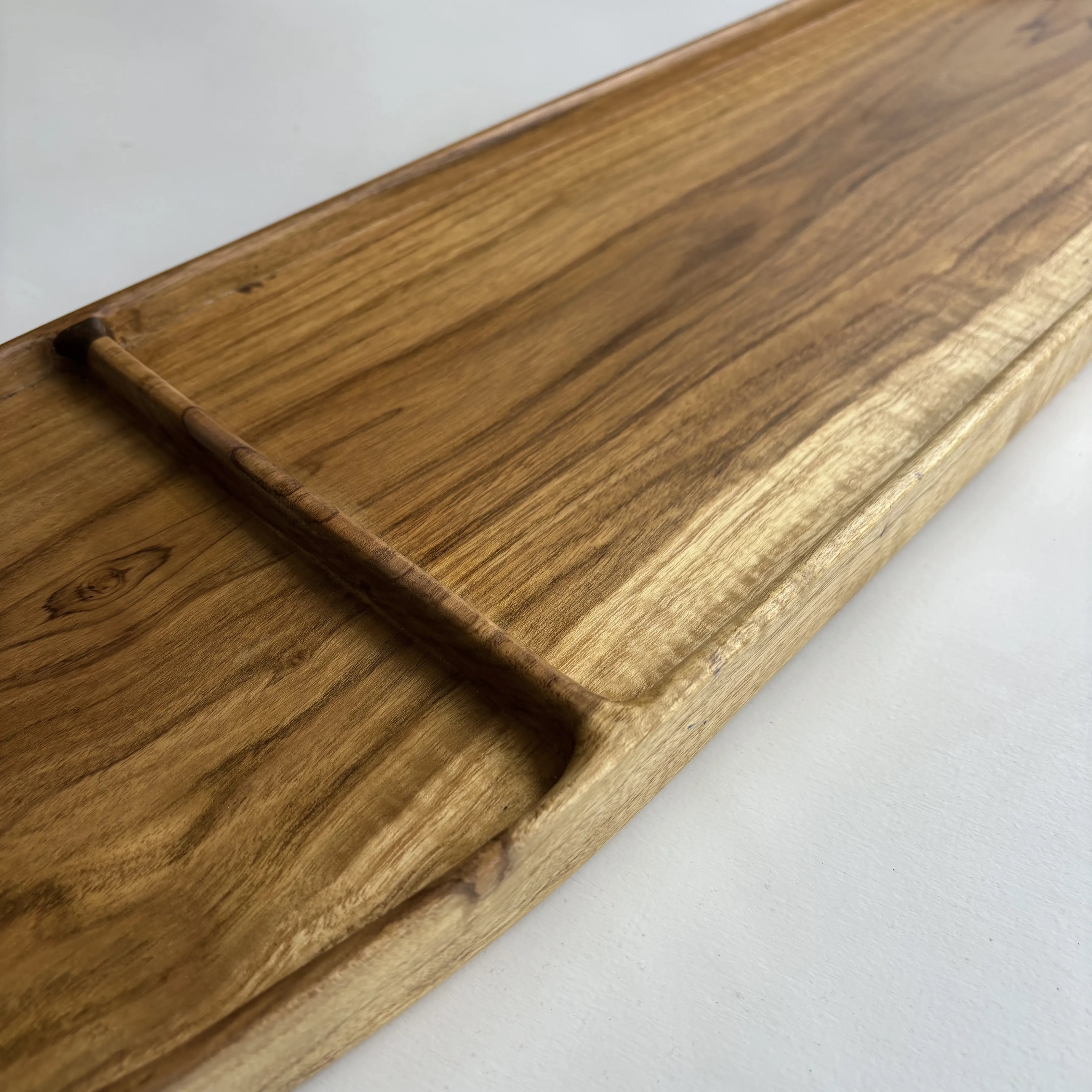 Teak bath caddy styled with lit candle and incense holder — WoodCeylon luxury bath tray
