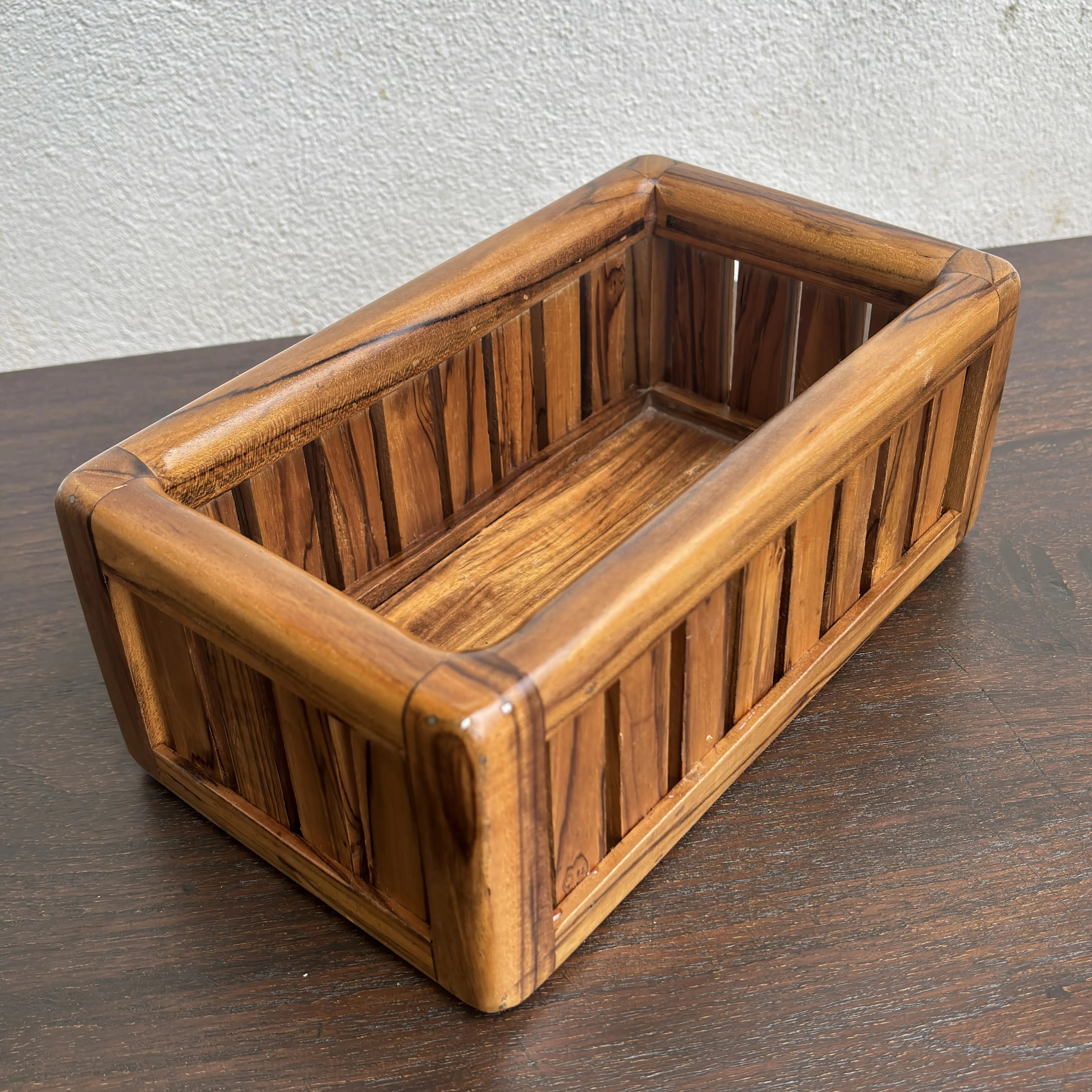 Wooden towel box storage with natural finish and slatted design by Wood Ceylon