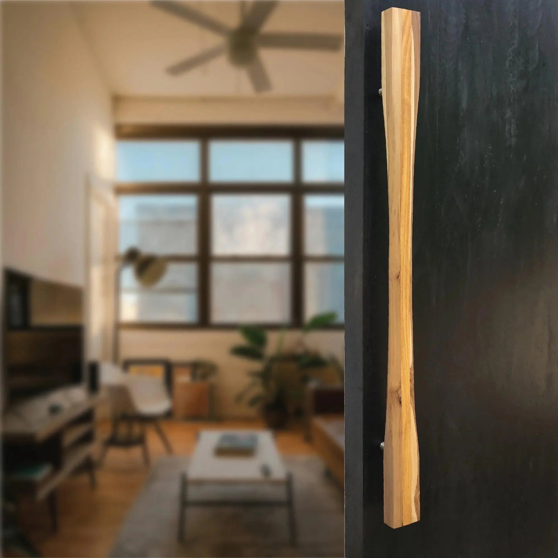 Elegant large front door handle in natural wood finish perfect for modern home entrances