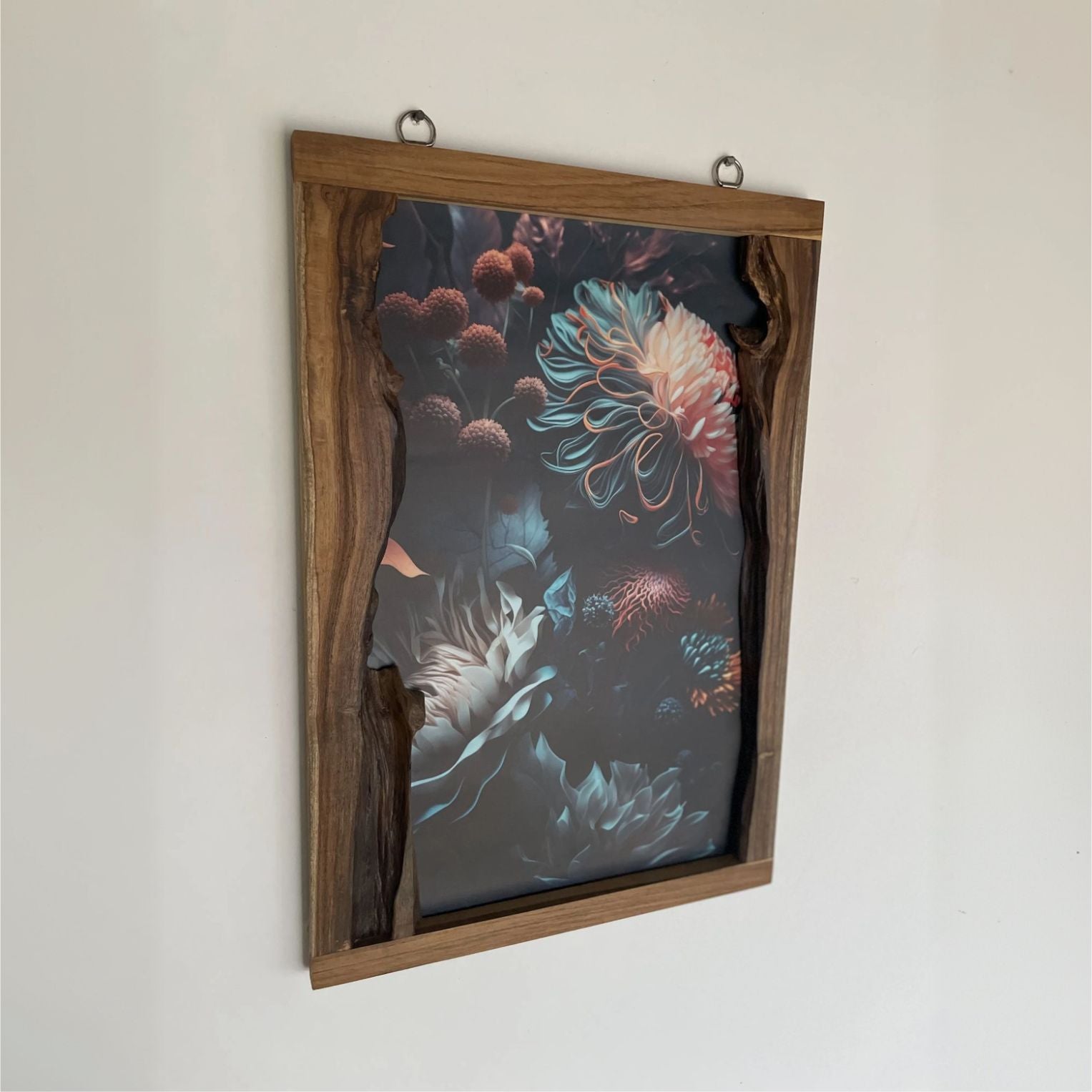 Live edge picture frame made of teak wood in natural finish, perfect for displaying artwork