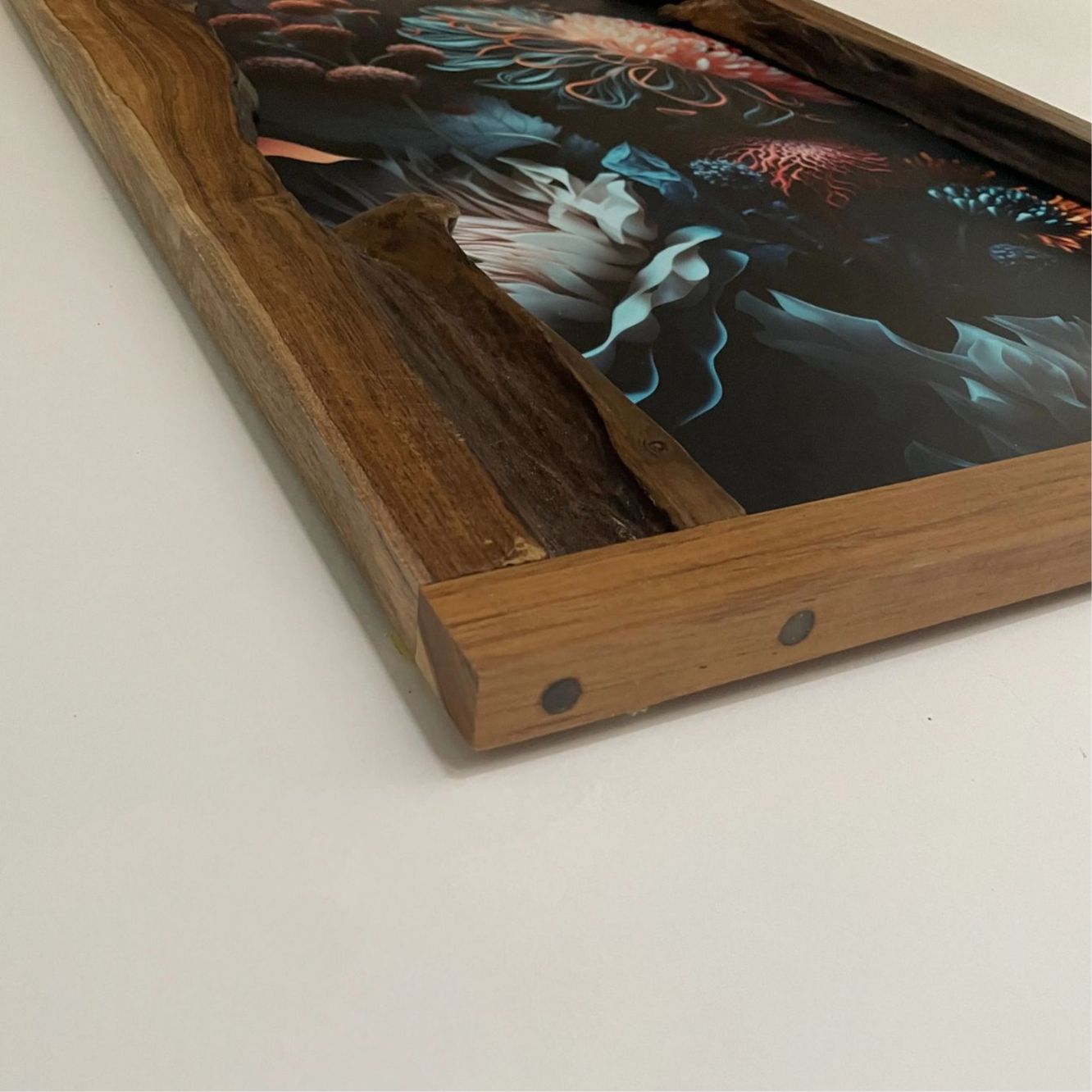 Live edge picture frame made of teak wood in natural finish