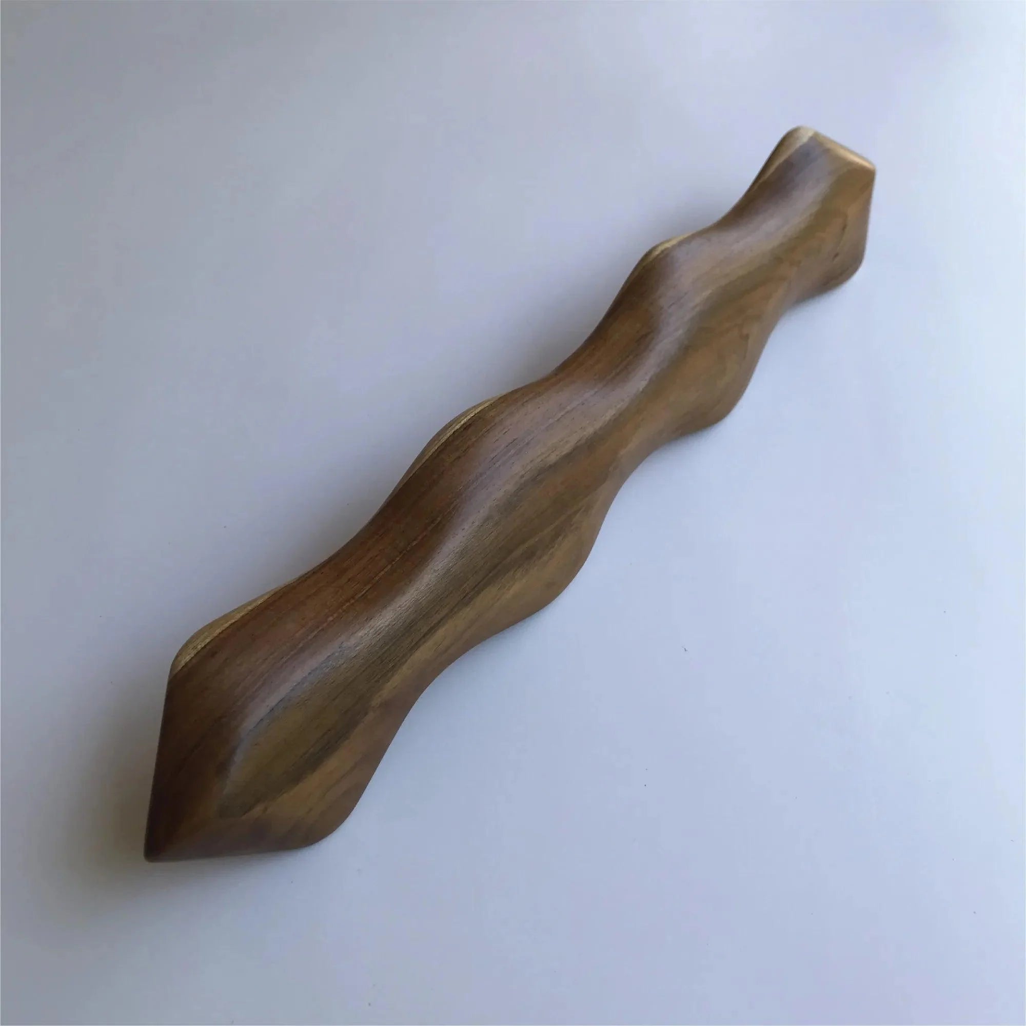 Elegant wooden snake shape door handle from Wood Ceylon with a smooth, ergonomic design