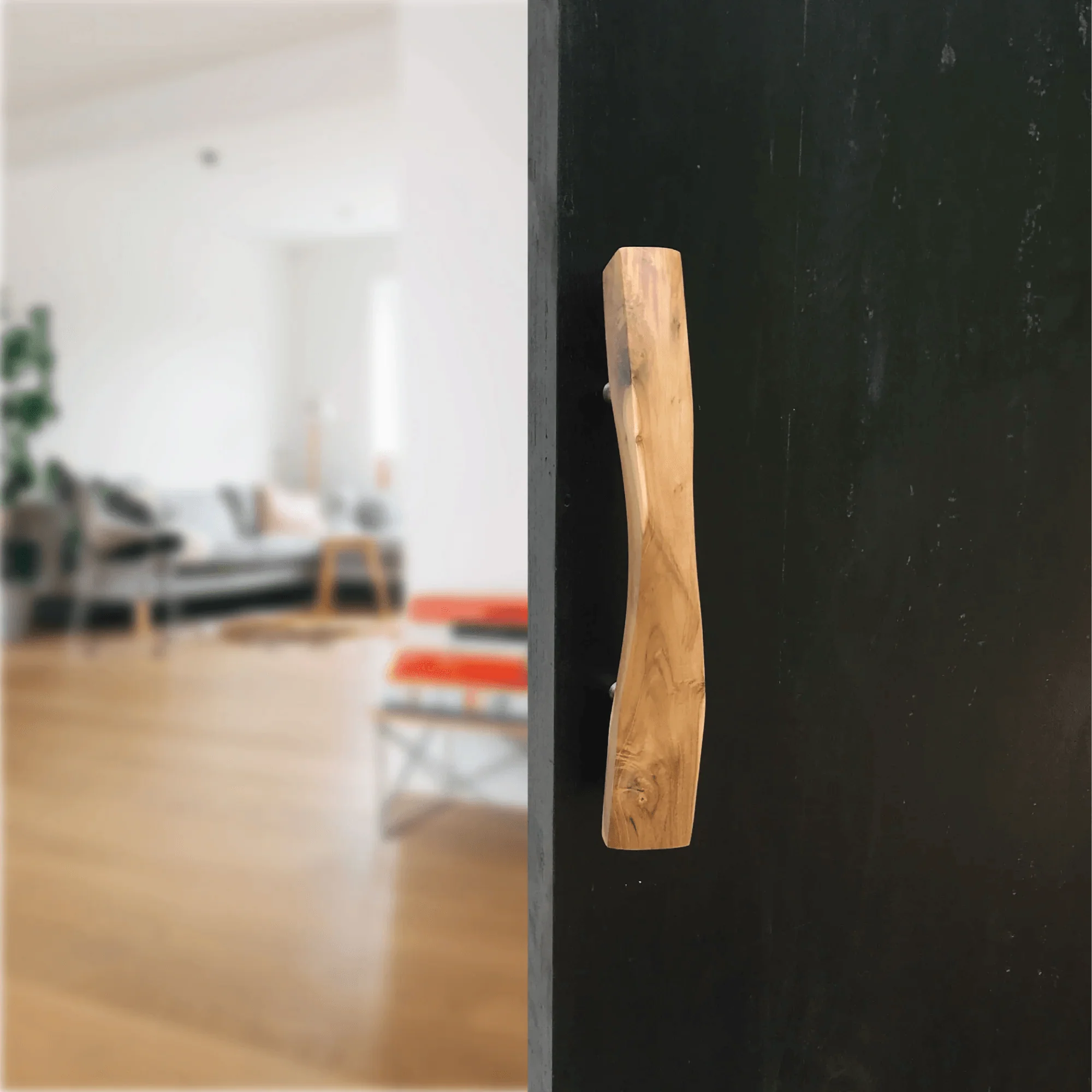 Solid wooden door handle made from natural wood, perfect for modern interior doors