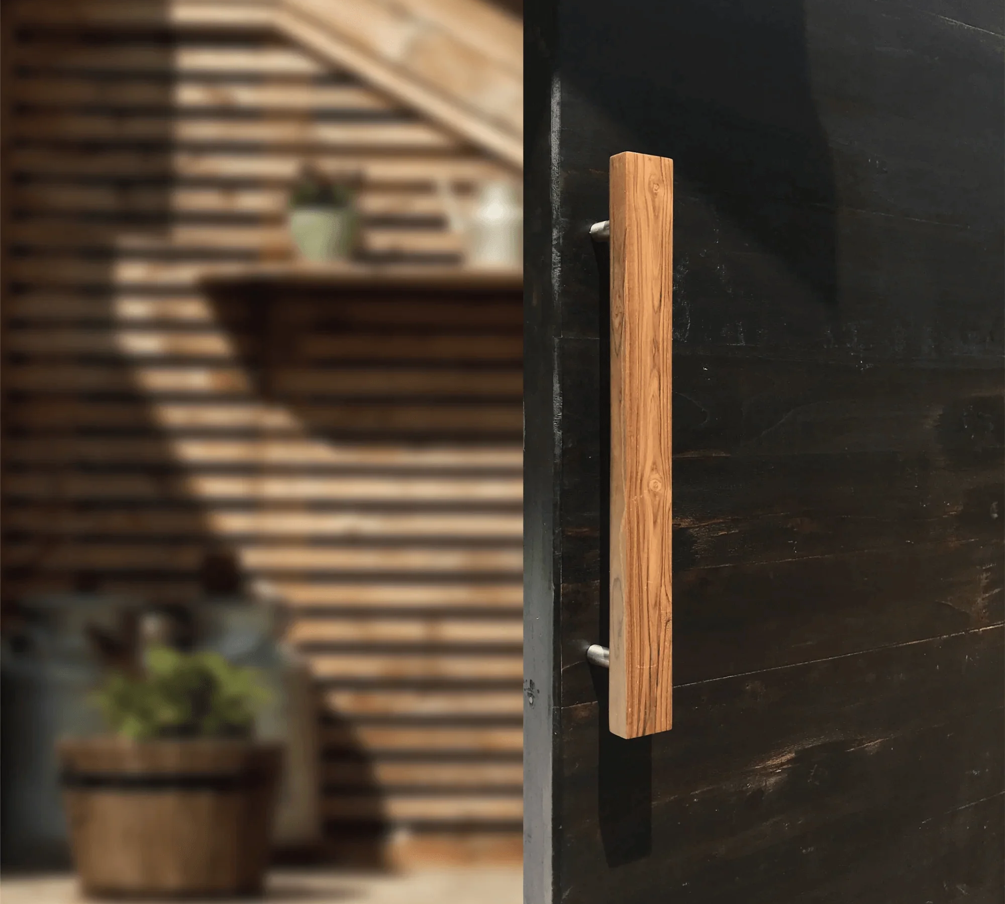 Teak barn door handles from Wood Ceylon showcasing elegant design and smooth finish