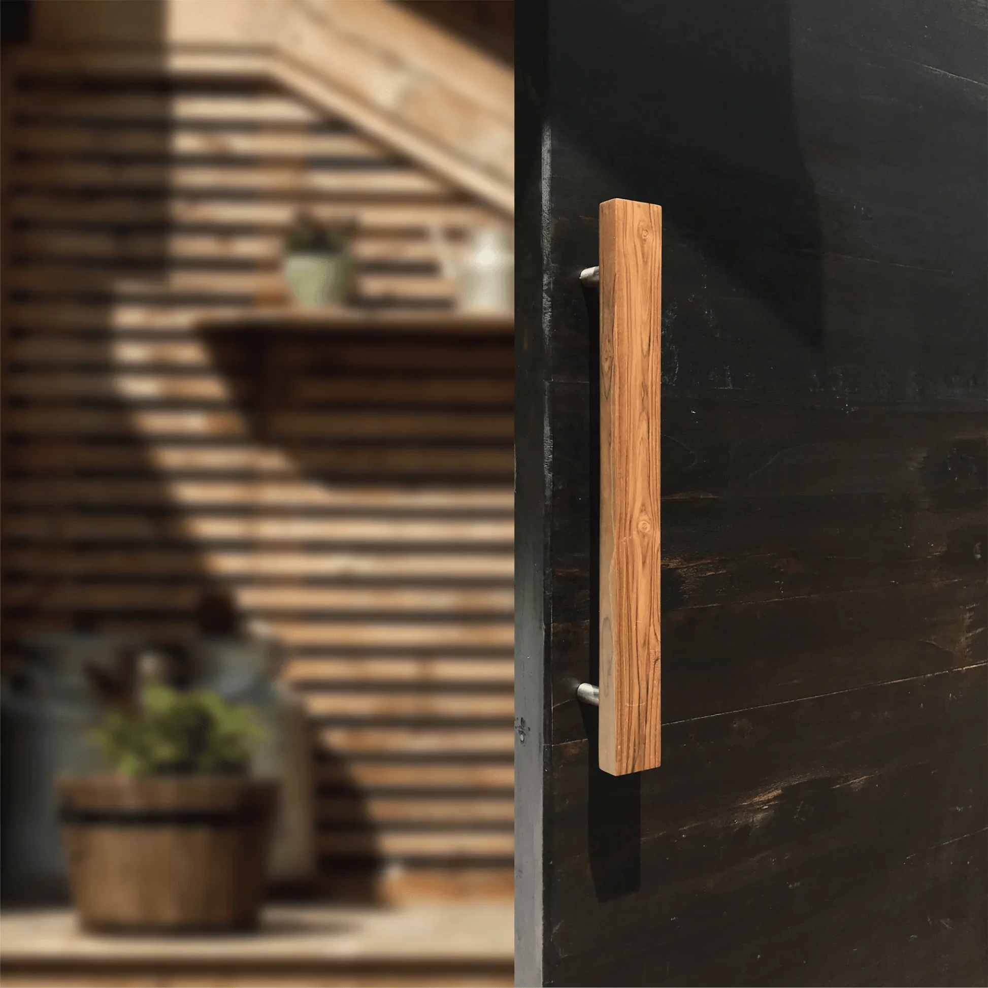 Teak barn door handles from Wood Ceylon showcasing elegant design and smooth finish