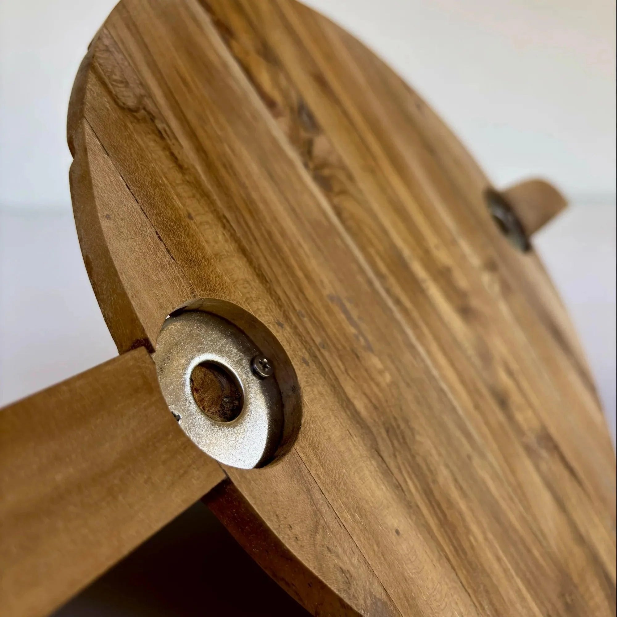 Close-up of Wood Ceylon teak floating plant shelf showing natural wood grain and metal mounting hardware