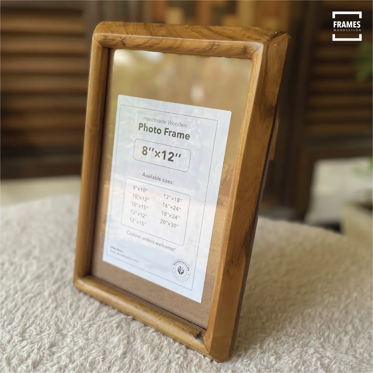 Handmade teak picture frame with a natural finish, showcasing an 8x12 size display option