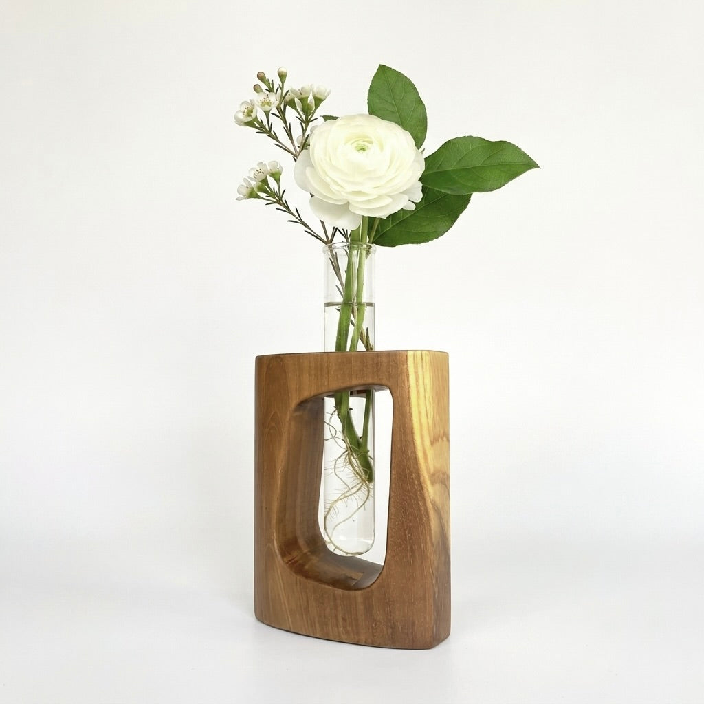 Teak test tube vase with a sleek design holding fresh flowers