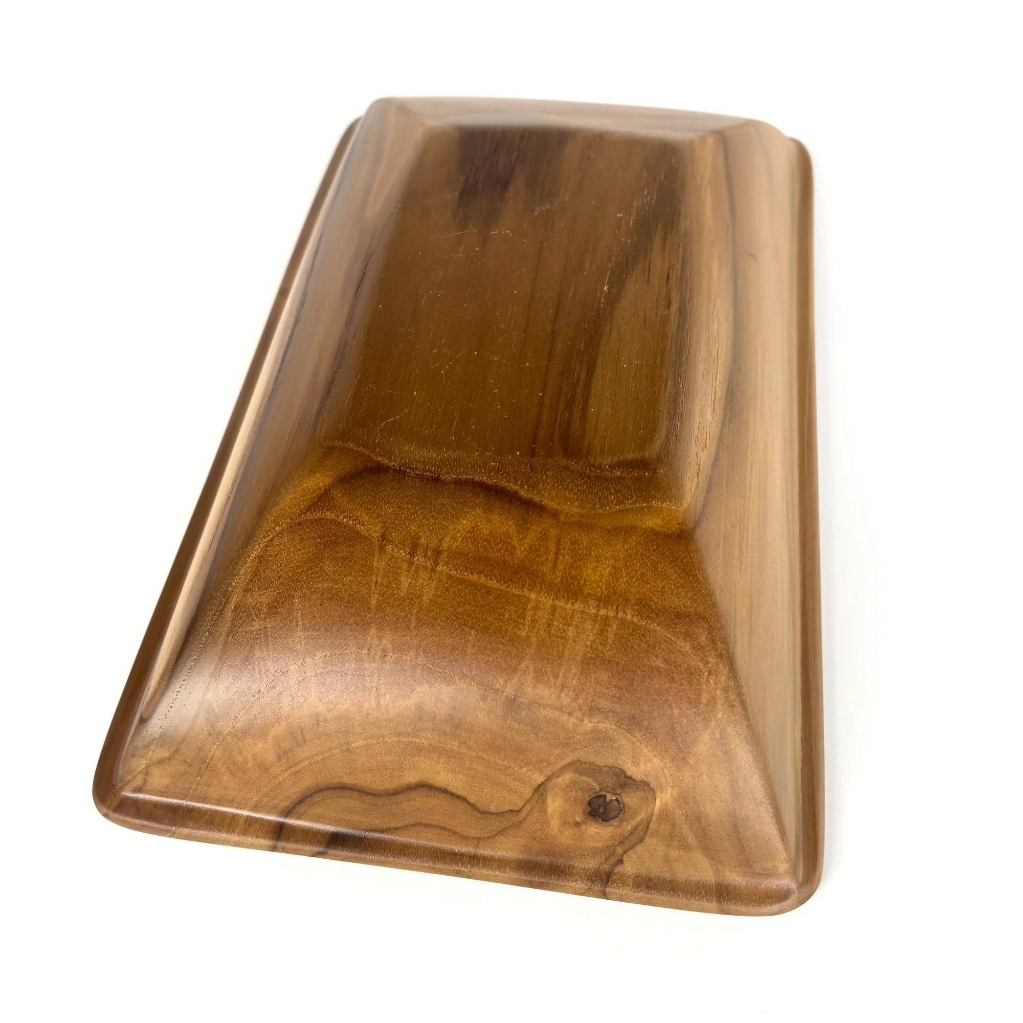 Handcrafted teak wood serving bowl with a smooth finish and elegant design for entertaining
