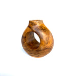 Unique teak wood test tube vase with a carved opening for stylish floral displays