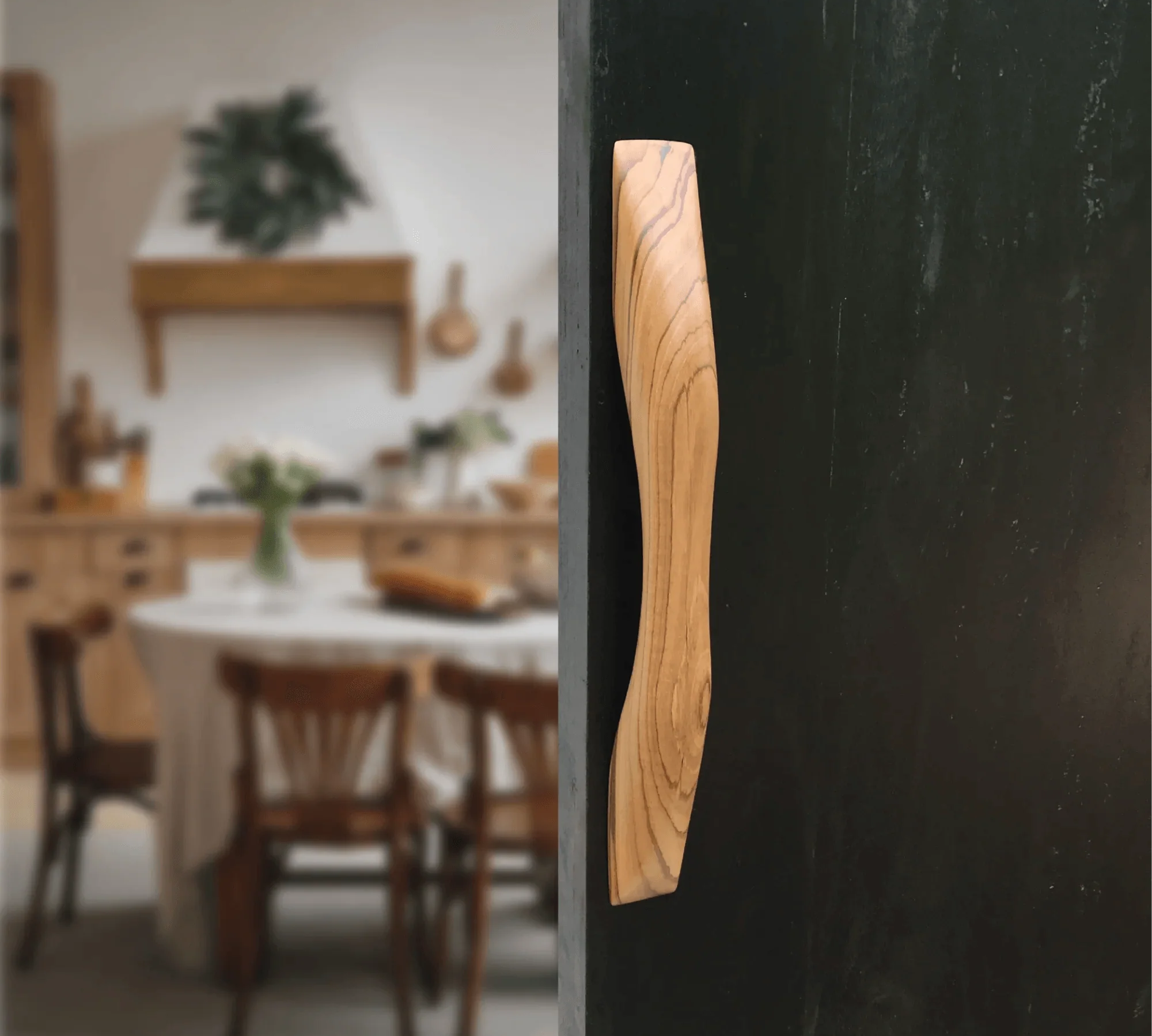 Teak wooden door handle with a sleek design, perfect for modern home décor