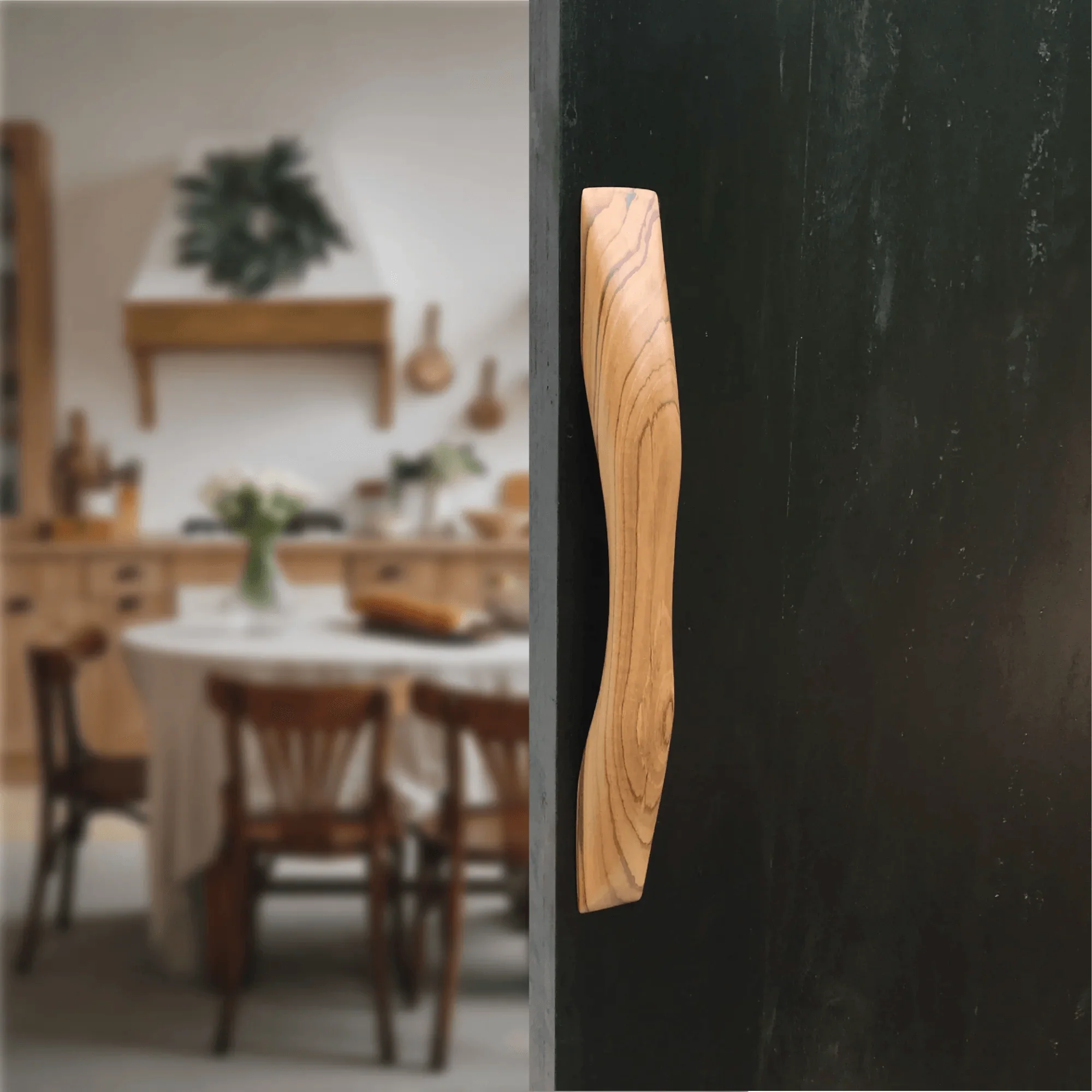 Teak wooden door handle with a sleek design, perfect for modern home décor