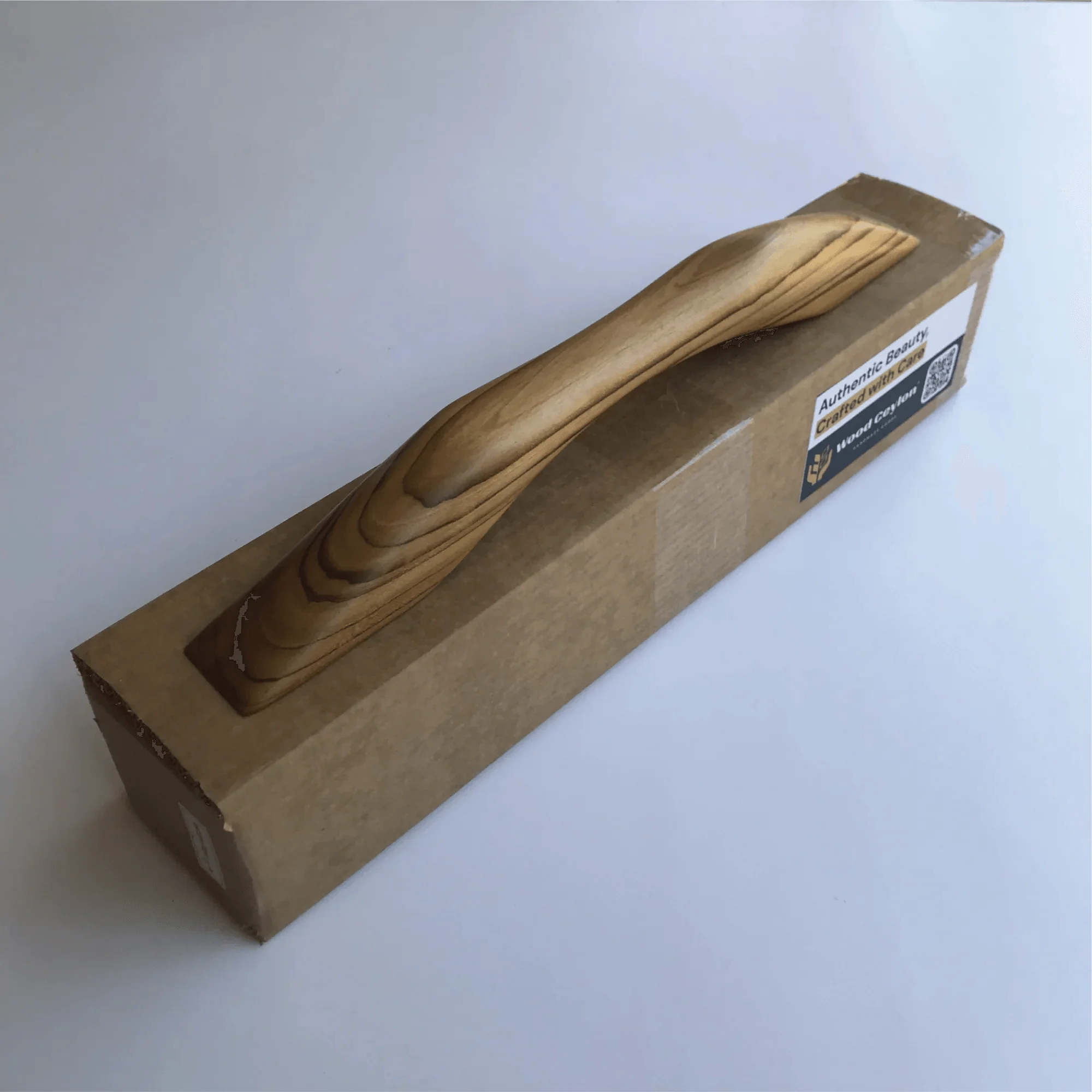 Teak wooden door handle by Wood Ceylon, beautifully crafted for a stylish entryway