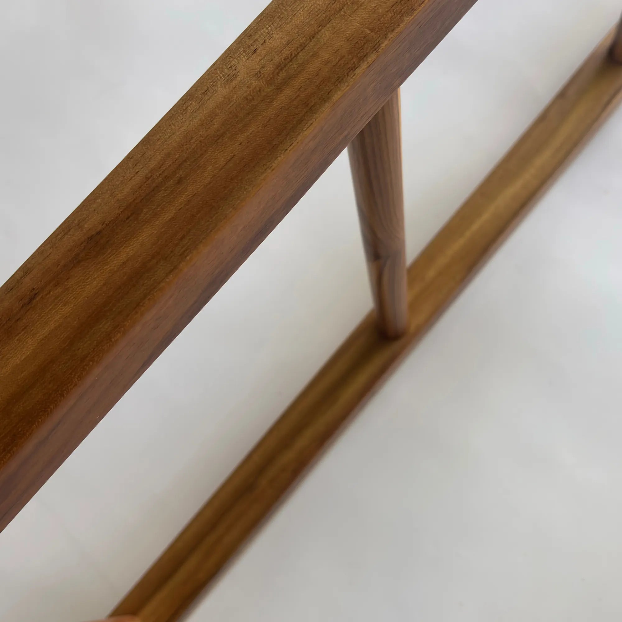 Teak towel ladder rack in natural finish for stylish bathrooms