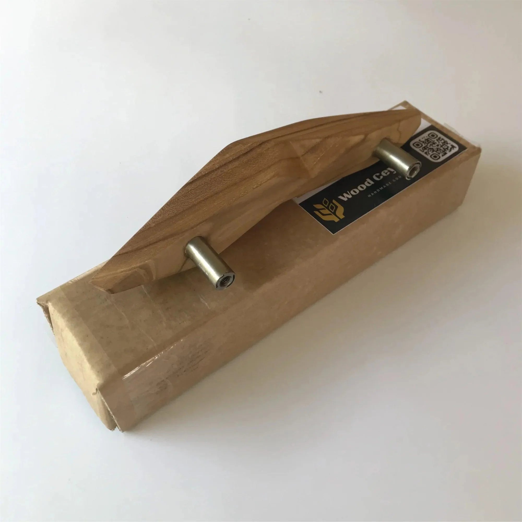 Unique teak door handle by Wood Ceylon showcasing an elegant design and sturdy materials