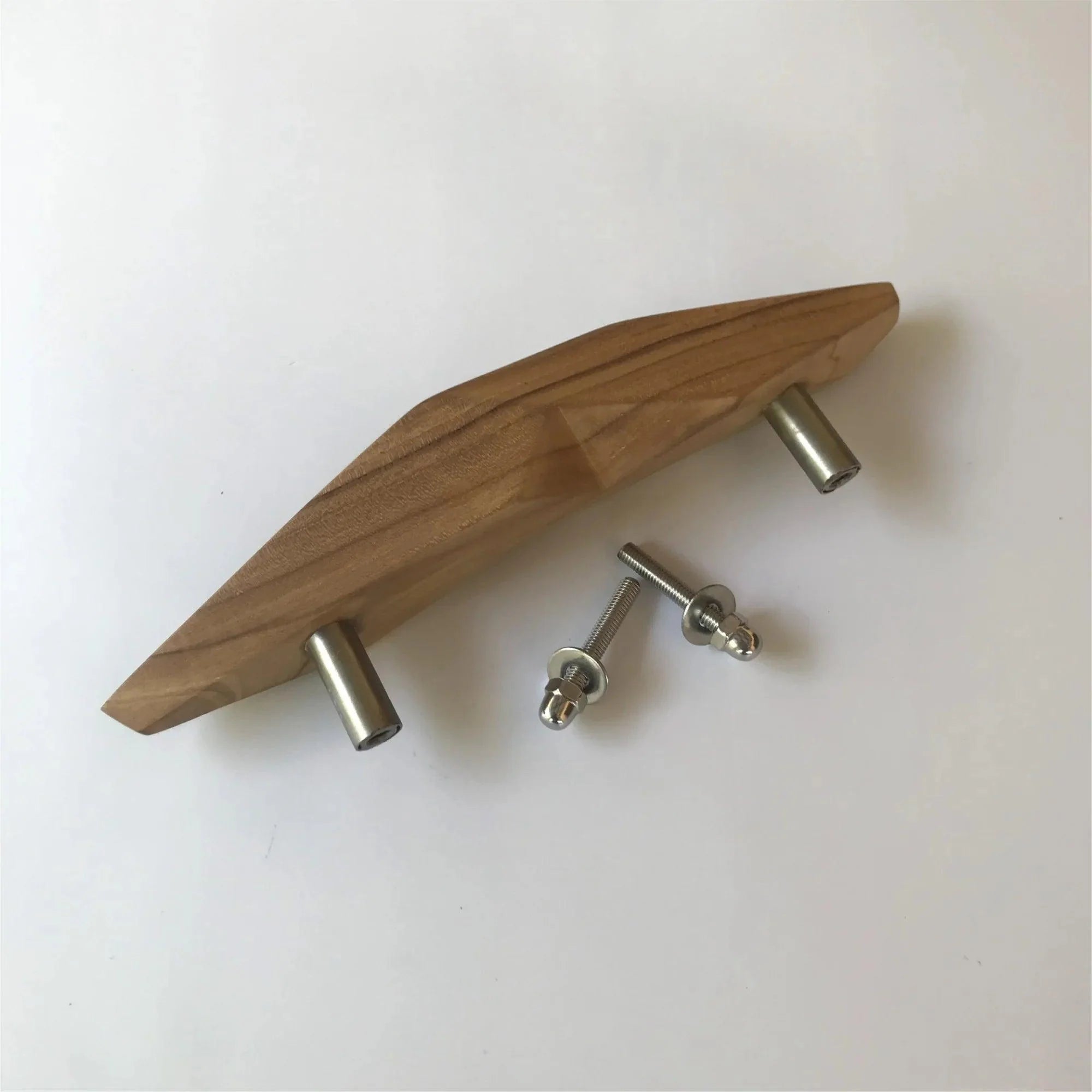 Unique teak door handle with stainless steel fittings for a stylish entrance
