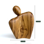Beautiful wood couple sculpture made from Ceylon wood, measuring 4.5 inches tall and 3.5 inches wide