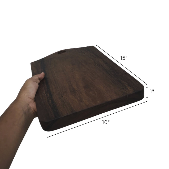 Wood Ceylon dark wood cutting board 15 by 10 inches with 1 inch thickness held in hand