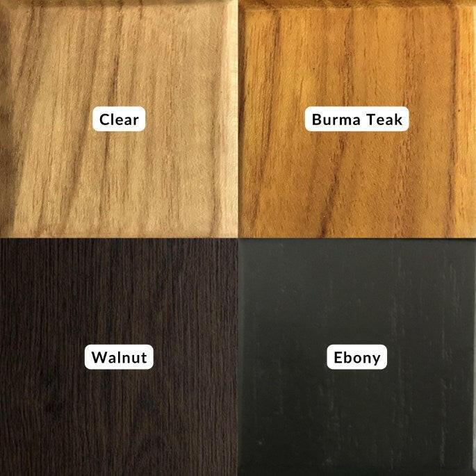 Wood grain samples in clear, Burma teak, walnut, and ebony finishes for trash can with swing top lid options