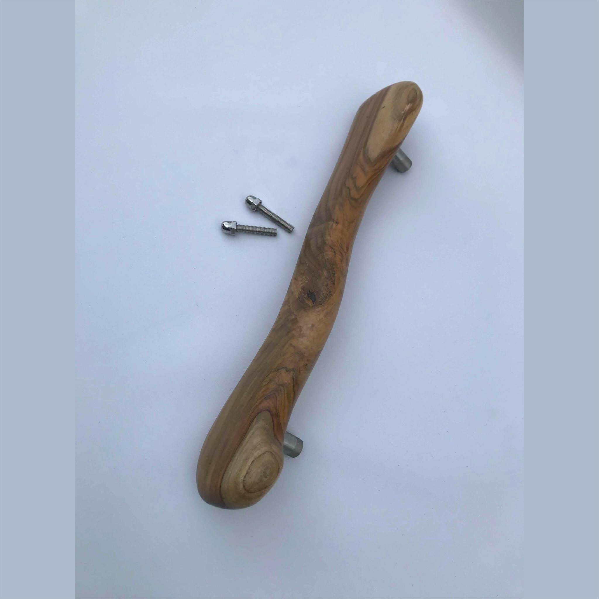 Wood Ceylon wooden door handle with natural grain and included mounting screws on white background