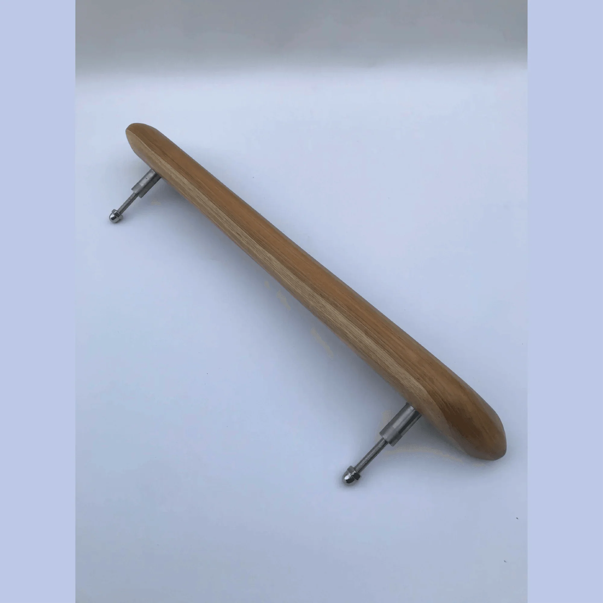 Wooden front door handle by Wood Ceylon with smooth finish and metal mounting hardware