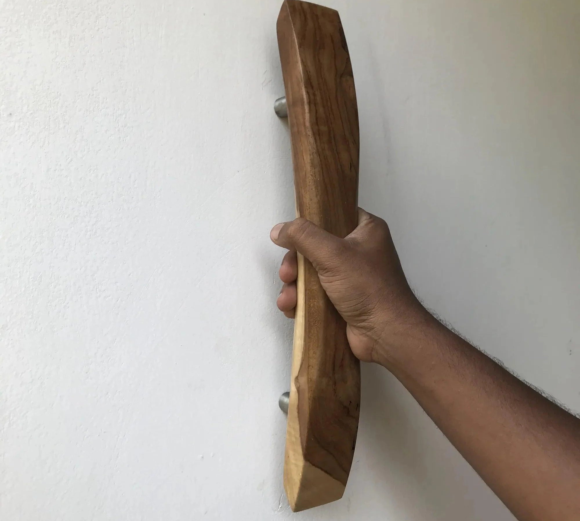 Stylish wooden front door pull handle designed for a modern aesthetic and easy grip