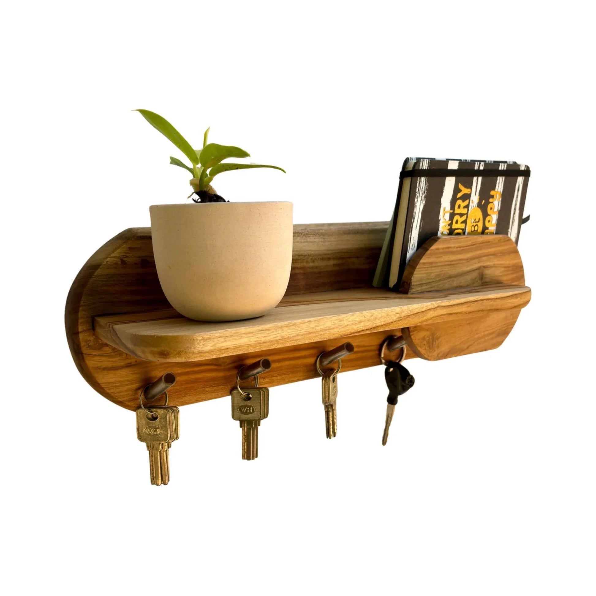 Wooden key holder with shelf featuring a plant and a notepad for convenient organization