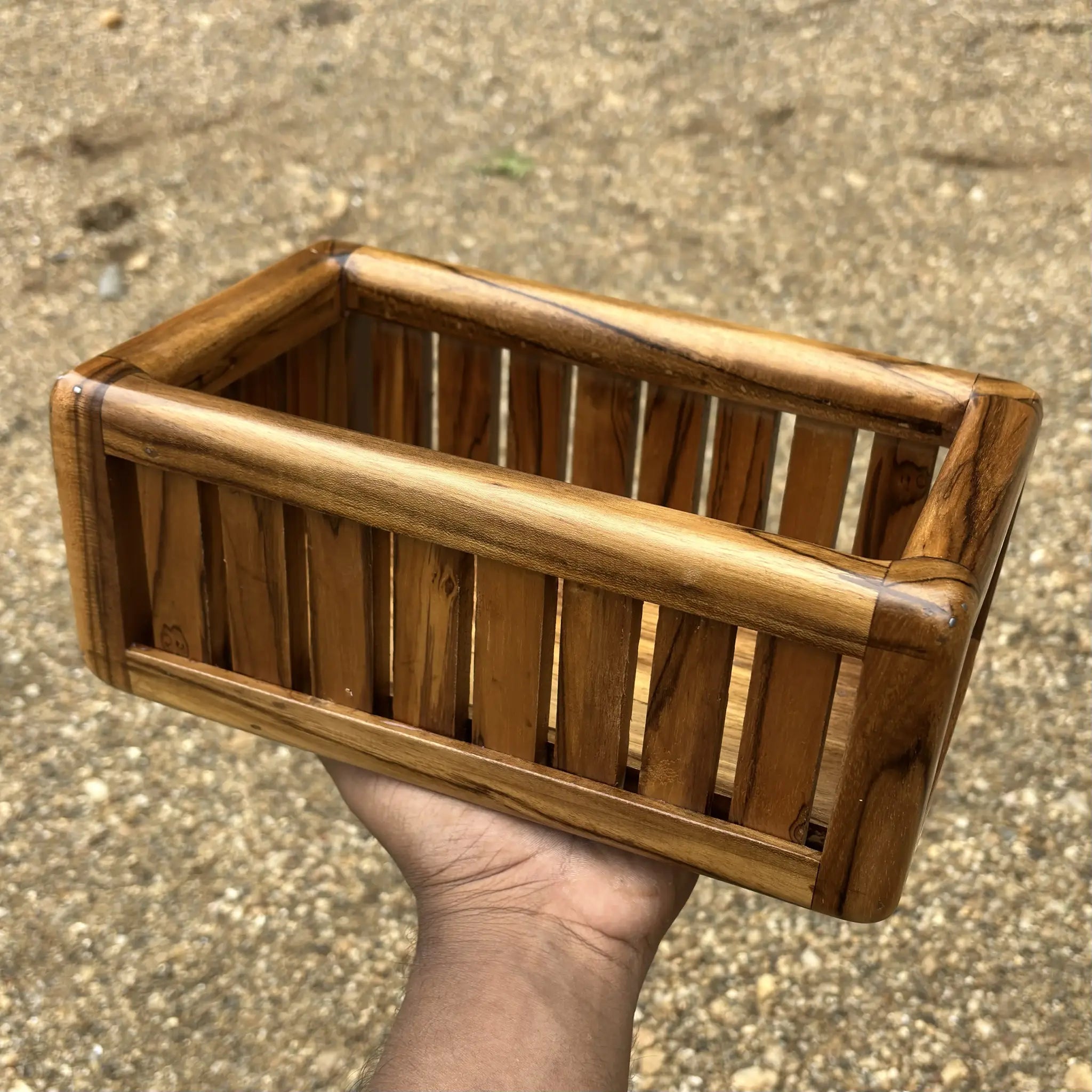Teak wooden paper towel holder in natural finish for kitchen use