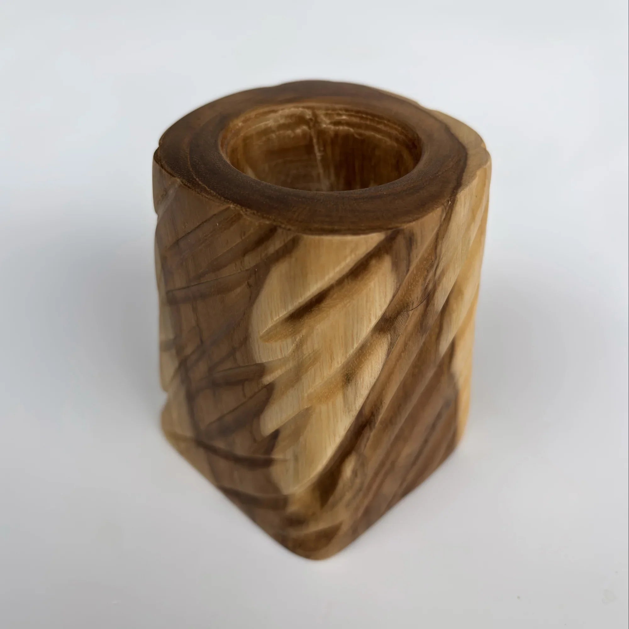 Handcrafted wooden plant pot for succulents with unique carved design and natural finish