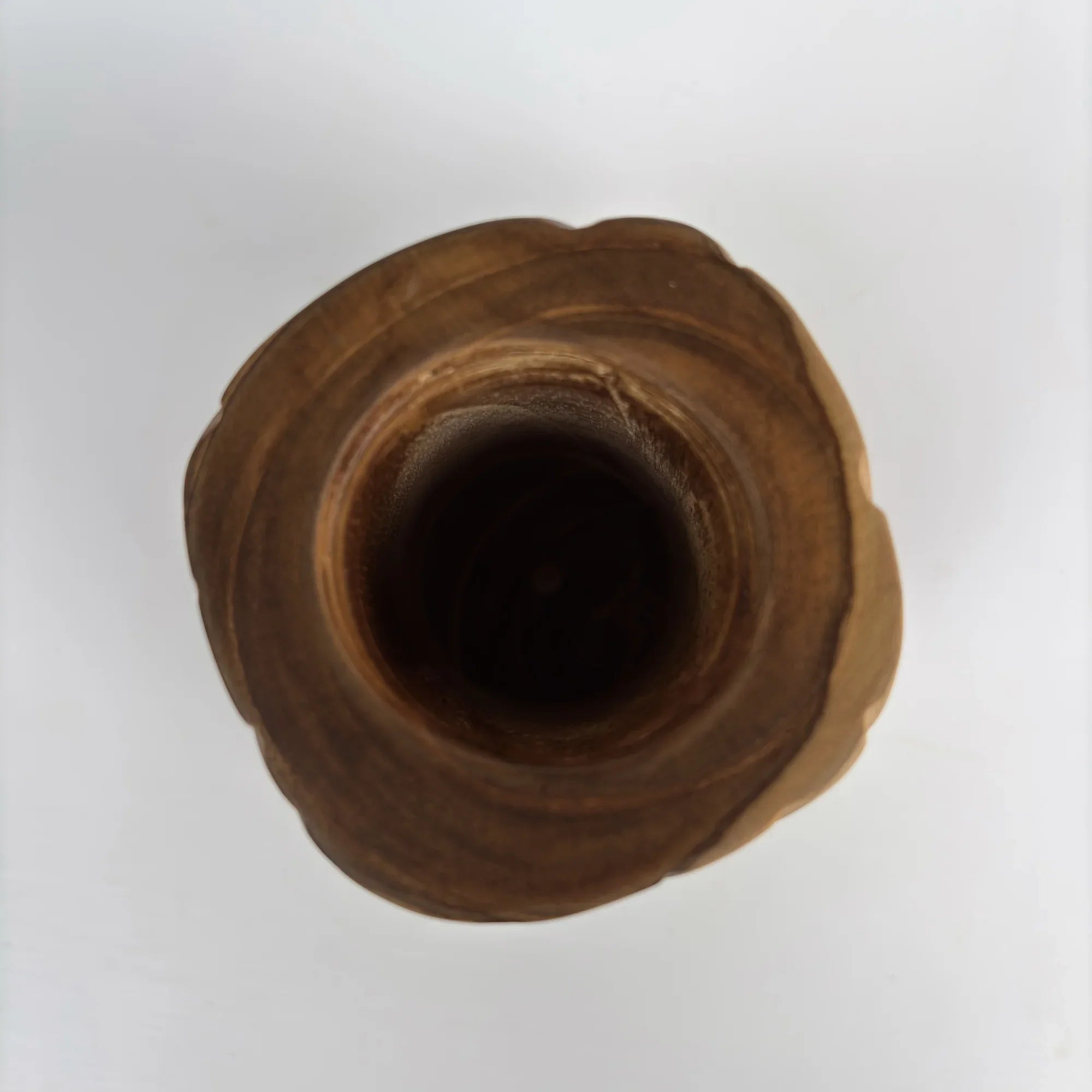 Top view of a rustic wooden plant pot for succulents with a smooth inner finish
