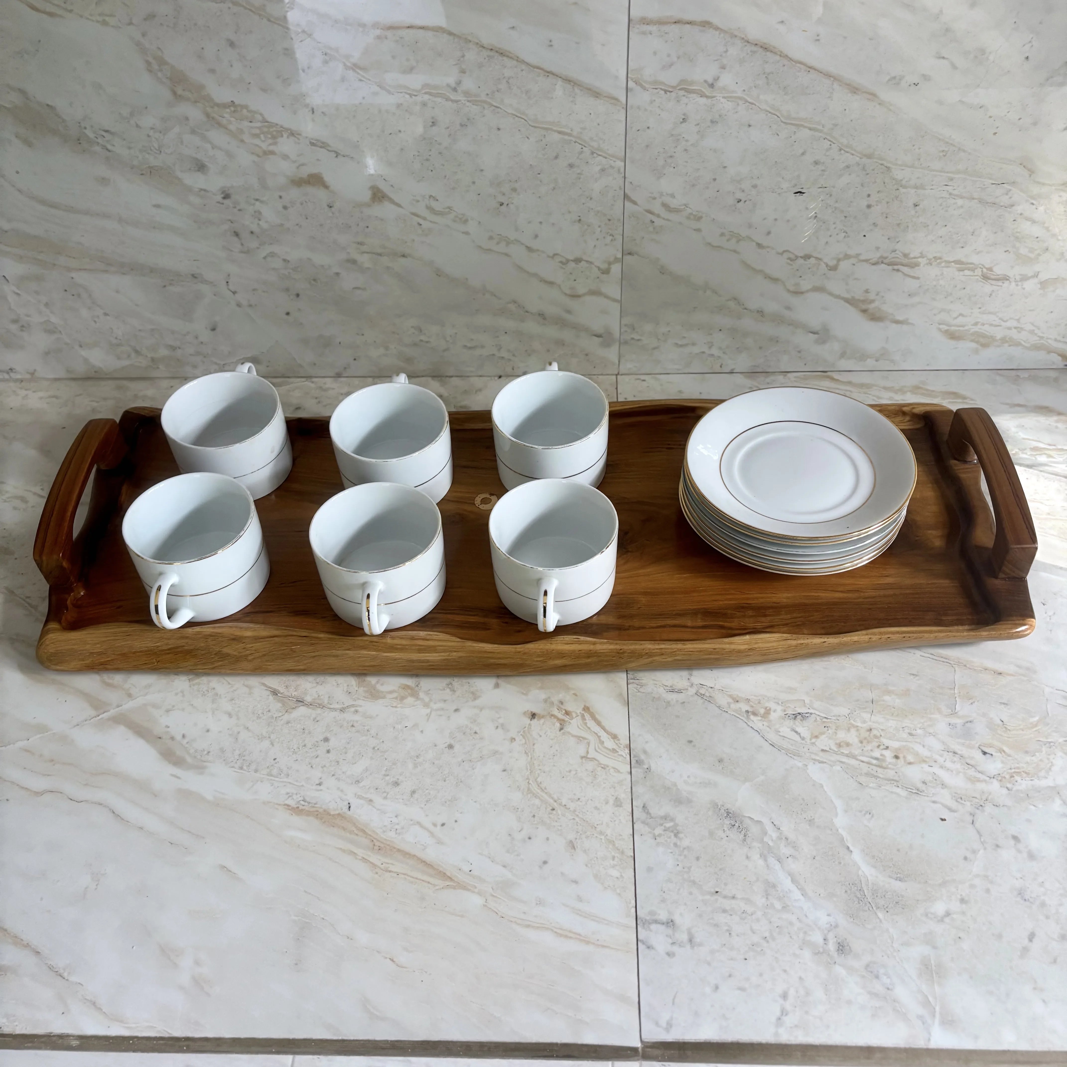 Wood Ceylon wooden serving tray with handles holding six white coffee cups and six small plates